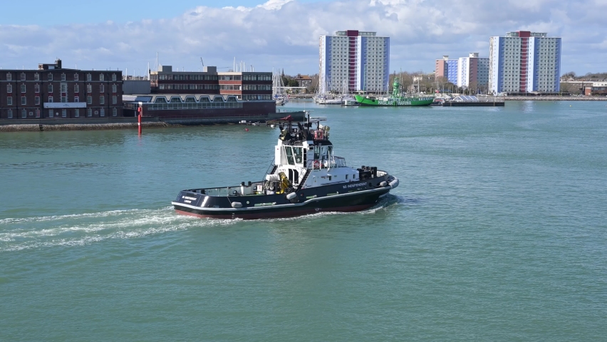 Portsmouth, Hampshire, UK, March 18, 2022. Tug Boat SD Independent entering Portsmouth Harbour in Hampshire England.