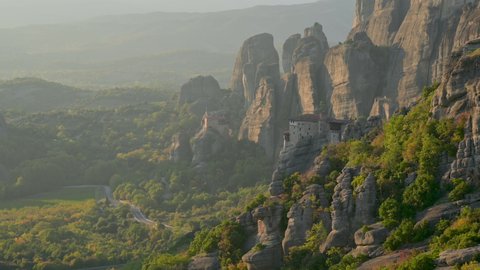 Famous Greece Meteora monasteries in rocks view of cliffs Greece, Europe. landscape place of monasteries on the rock. UNESCO World Heritage. Travel. Tourism.
