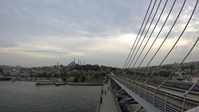 Istanbul. Istanbul time lapse footage day to night from Halic Metro Bridge. Travel to Turkey background 4k video. Noise included.
