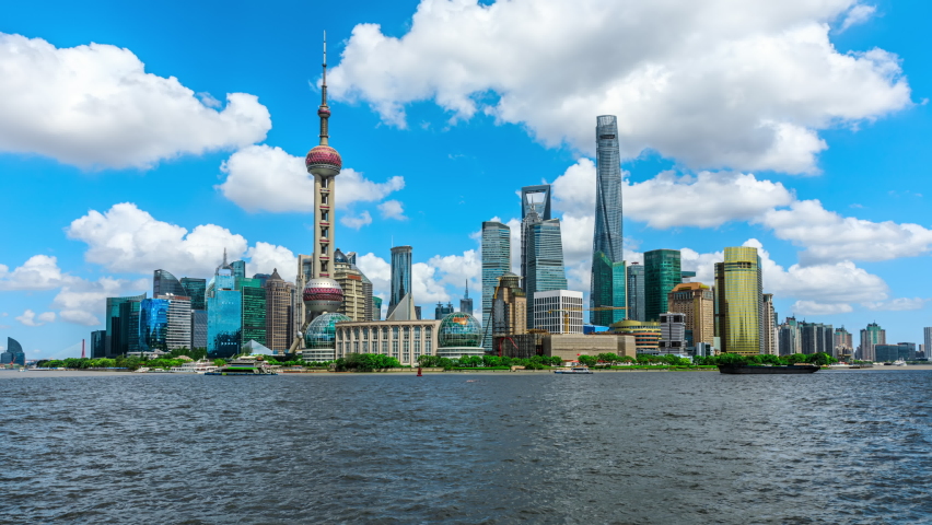 Shanghai city skyline and modern buildings with beautiful sky cloud scenery, China. Famous Shanghai landmarks. 4K Time lapse.