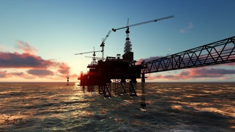 Offshore oil and rig platform in sunset time. Construction of production process in the sea. Power energy of the world.