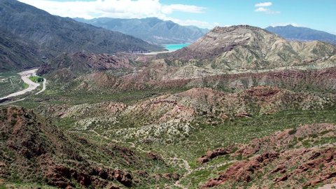 Cinematic aerial view of the Cacheuta valley in Mendoza, Argentina. Drone footage. Incredibly picturesque mountain landscape and wild nature. 