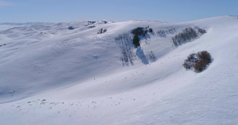 Snowy hilltops near Anderson Ranch Reservoir Idaho  4k drone footage
