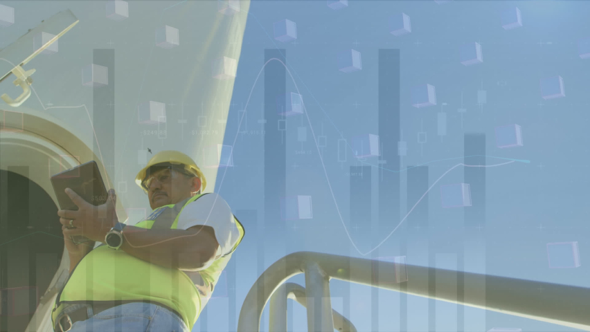 Animation of graphs, data over caucasian male worker using tablet at wind turbine. environment, sustainability, renewable energy, business and technology concept digitally generated video. - Powered by Shutterstock - Get 15% off with code: PIKWIZARD15