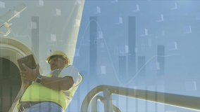 Animation of graphs, data over caucasian male worker using tablet at wind turbine. environment, sustainability, renewable energy, business and technology concept digitally generated video. - Powered by Shutterstock - Get 15% off with code: PIKWIZARD15