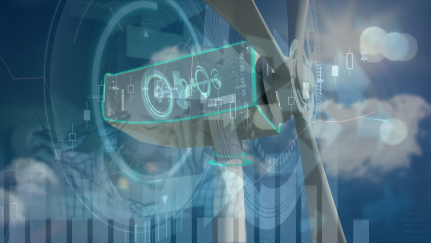 Animation of graphs, diverse data and wind turbine moving over caucasian man working in office. sustainability, renewable energy, business and technology concept digitally generated video. - Powered by Shutterstock - Get 15% off with code: PIKWIZARD15