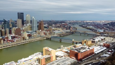 Pittsburgh , Pennsylvania , United States - 03 13 2022: Panoramic Aerial View of Pittsburgh Skyline downtown drone shot