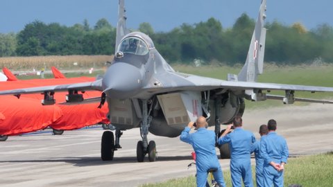 Udine Italy SEPTEMBER, 5, 2015 Military plane of Warsaw Pact taxiing on airport runway. Mikoyan MiG-29 Fulcrum of Polish Air Force designed in USSR Union of Soviet Socialist Republics in Cold War