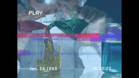 Animation of screen with glitch over hand of lab worker pouring reagent into glass. science, chemistry, experiments and digital interface concept digitally generated video. - Powered by Shutterstock - Get 15% off with code: PIKWIZARD15