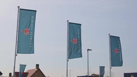 Bishop's Stortford. Hertfordshire. UK. March 22nd 2022. Charles Church house builder advertising flag banners.
