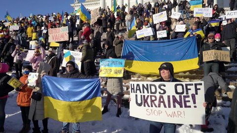 HELSINKI, FINLAND - FEBRUARY 25, 2022: Thousands of anti-war rally in Helsinki. Many people are protesting against the war in Ukraine and Putin's military aggression against Europe