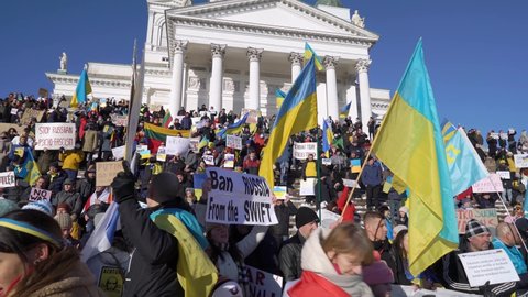 HELSINKI, FINLAND - FEBRUARY 25, 2022: Thousands of anti-war rally in Helsinki. Many people are protesting against the war in Ukraine and Putin's military aggression against Europe