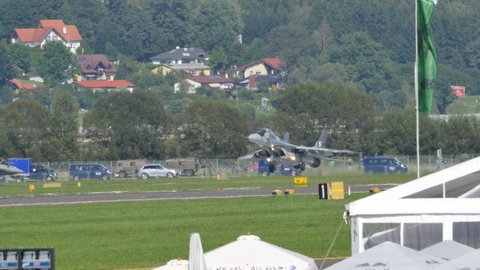 Zeltweg Austria SEPTEMBER, 3, 2016 MiG-29 fighter jet aircraft of Polish AirForce lands with breaking parachute opened. Mikoyan Gurevich MiG-29 Fulcrum of Polish Air Force. High Quality 4K video