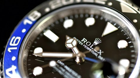 Bangkok Thailand- Feb 20,2022 :Close up Rolex GMT-Master II "Batman"40mm with blue-black bezel Steel Ceramic Men's Wrist watch on black background