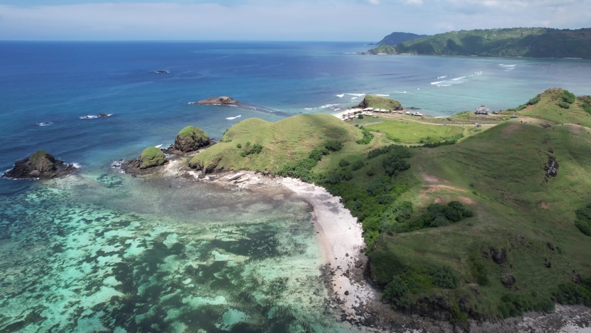 Lombok beach view frome above, Flying over Kuta Beach Lombok Royalty-Free Stock Footage #1088579635
