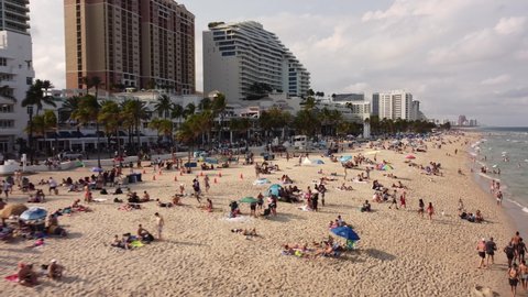 Fort Lauderdale, FL, USA - March 20, 2022: Beautiful young people on Fort Lauderdale Beach FL during 2022 Spring Break