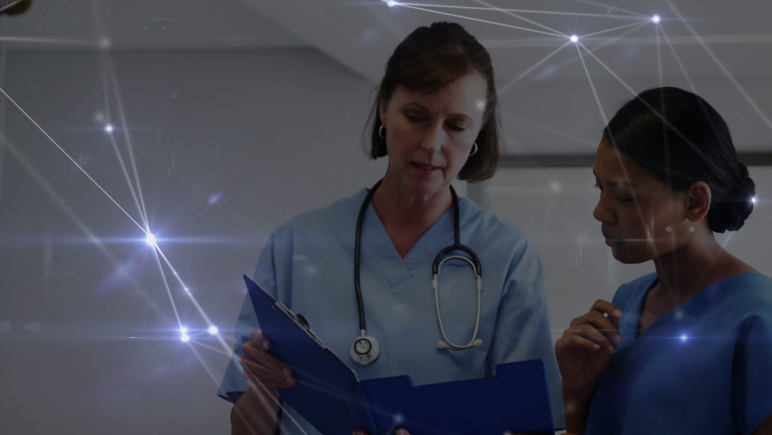Animation of network of connections over diverse doctors. global medecine, healthcare and connections concept digitally generated video.