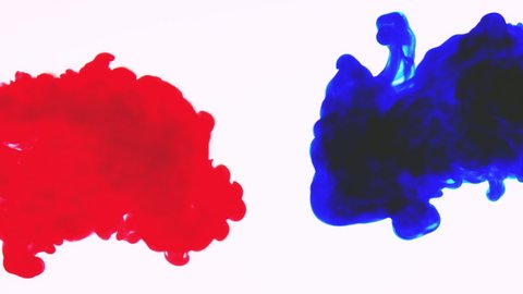 Real shot colors drop in water in slow motion, swirling ink under water, clouds clashing ink, isolated on black background with alpha. Colorful abstract smoke bomb animation, close-up view. white back