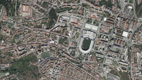 Earth zoom in from space and focus on Coimbra, Portugal. The animation continues by zoom out through clouds and atmosphere into space. Background for travel intro.