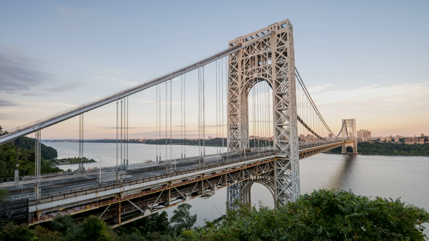 Day to Night POV Timelapse Sunset Clouds Moving Over George Washington Bridge with Peak Hour Traffic | Shutterstock HD Video #1088589443