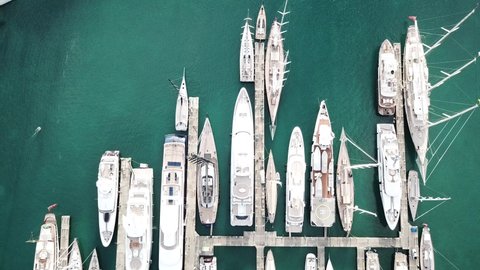 Aerial footage of superyachts moored in Falmouth, Antigua