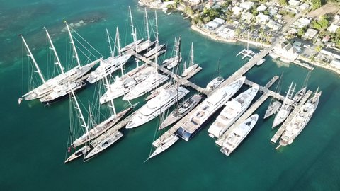 Aerial footage of superyachts moored in Falmouth, Antigua