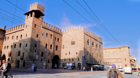 Bologna, Italy - September 2021: Via Rizzoli and Palazzo Re Enzo, symbols of medieval Bologna towers.