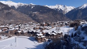 Aerial view of ski resort in French alps by winter