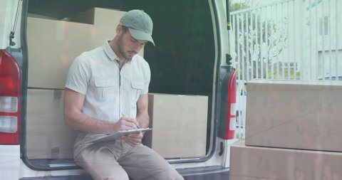 Animation of financial data over happy caucasian male courier counting packages. business, finance and delivery services concept digitally generated video.