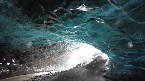 Ice Cave in Vatnajokull, Iceland.The beauty of the caves filled with blue ice.