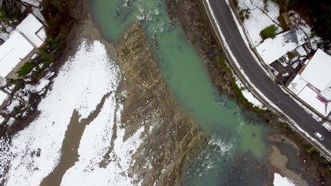 Top down view on Rioni river at winter time in Kutaisi, Georgia.