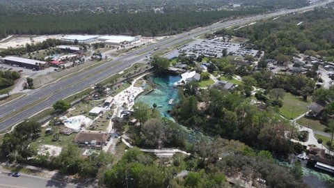 aerial of the beautiful natural spring at Weeki Wachee Springs State Park, home of the original mermaid shows and amusement rides. Old-time Florida tourist attraction