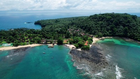 Aerial view overlooking a resort on the Ilheu das Rolas island, in sunny Sao Tome
