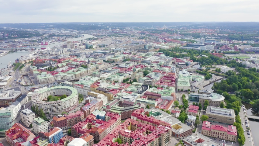 Inscription on video. Gothenburg, Sweden. Panorama of the city central part of the city. Cloudy weather. Name is burning, Aerial View