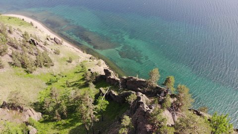Aerial view of the steep shore of Lake Baikal in summer.