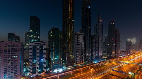 Dubai, United Arab Emirates - October 21 2021: Time Lapse of a sunrise in Dubai with the skyscapers and Sheikh Zayed road