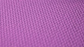 Embossed purple color texture. Geometric pattern on a colored surface.
