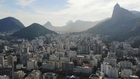 Aerial View Of The City Of Rio De Janeiro With Mount Corcovado In The Distance