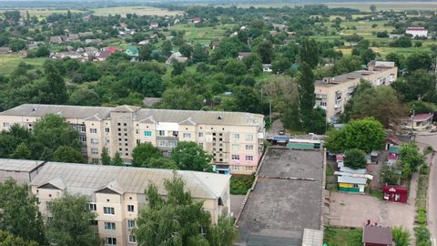 Aerial Drone video of Kalyta town apartment buildings on the border of Kyiv Oblast and Chernihiv Oblast Ukraine. Filmed on a summer day in August 2021