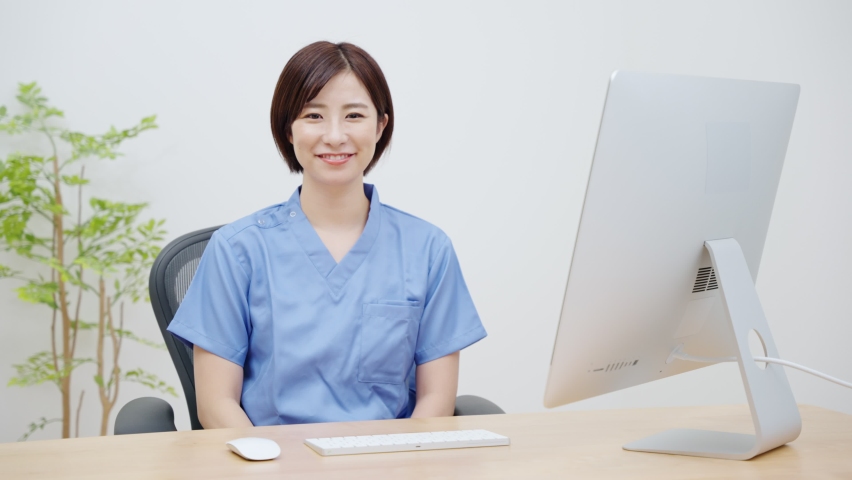 Young Asian female doctor working Royalty-Free Stock Footage #1088666571