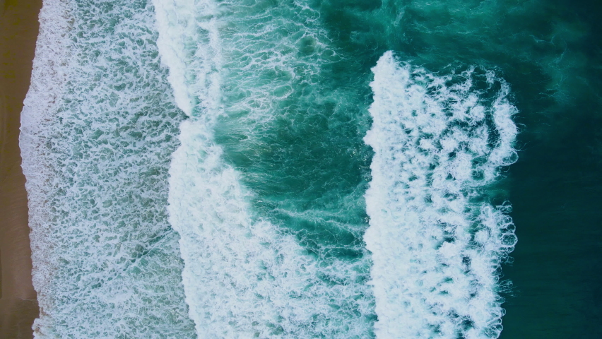 Scene of Beautiful sea waves. Aerial view of drone. Beach sand and sea copy space area. Summer sunset seascape. Phuket Thailand Beach. Water texture. Nature and travel concept.