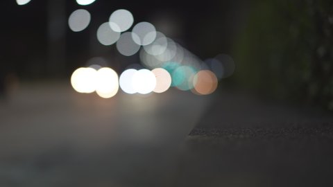 blur light bokeh by car headlight and street light on the street road in city to movement or motion at dark night for background with nature car sound