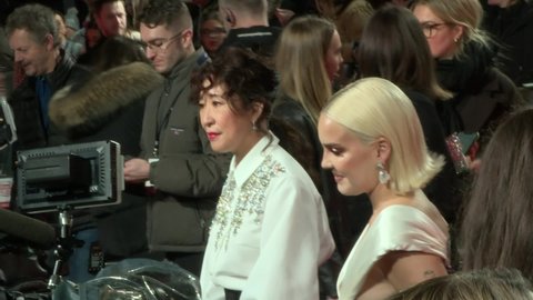 London, England - February 21st 2022:  Sandra Oh and Anne-Marie at the Turning Red Film Premiere in London