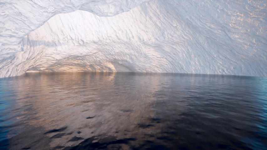 Traveling deep inside a snow-covered ice cave to its large open center. Royalty-Free Stock Footage #1088674705