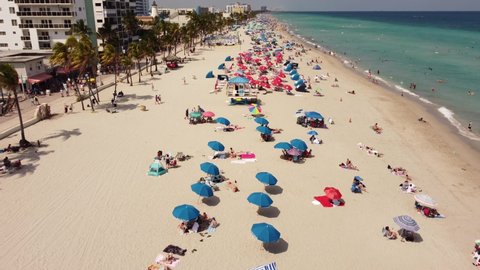 Hollywood, FL, USA - March 20, 2022: Spring Break full crowded beaches after covid restrictions lifted 2022