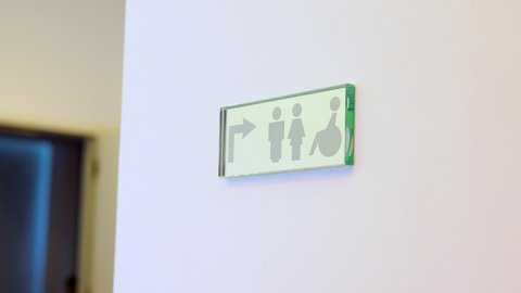 sign toilet for women men and disabled