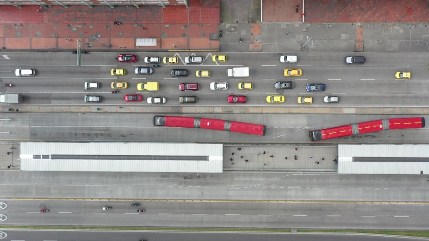 Aerial view of a public transport bus station in the city of Bogota. Colombia. Royalty-Free Stock Footage #1088692897
