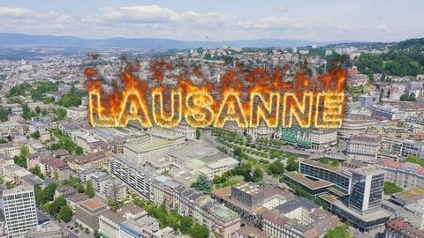Inscription on video. Lausanne, Switzerland. Flight over the central part of the city. Name is burning, Aerial View, Departure of the camera