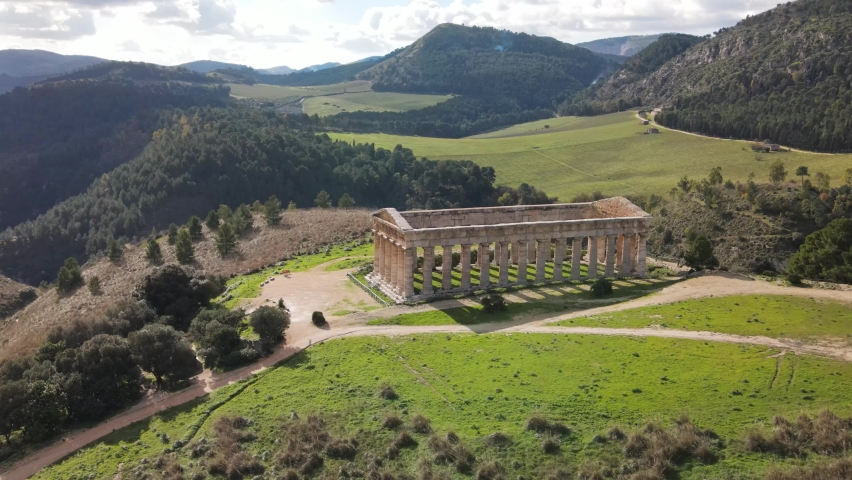 Temple of Segesta in the countryside of Sicily, Italy. Aerial view from drone Royalty-Free Stock Footage #1088697227