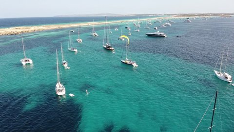 AERIAL DRONE FOLLOWING KITEFOIL IN FORMENTERA
